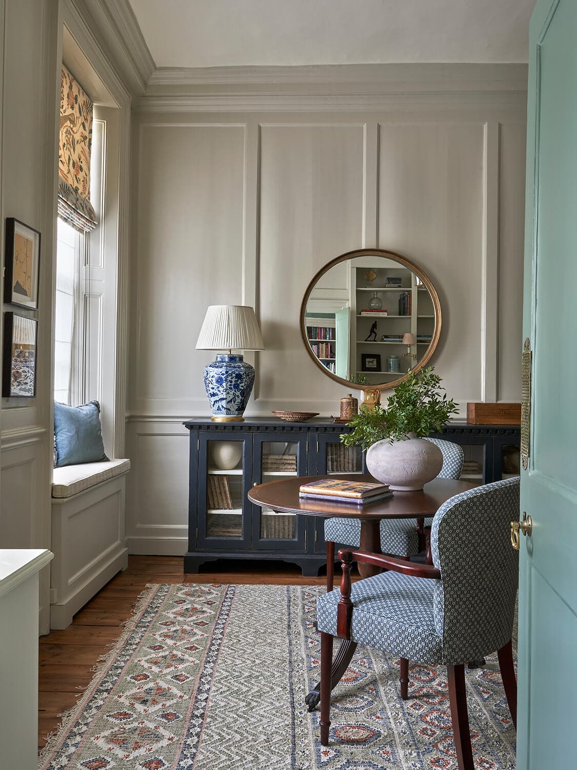 Doorway into the second study, framed by original architrave and painted joinery